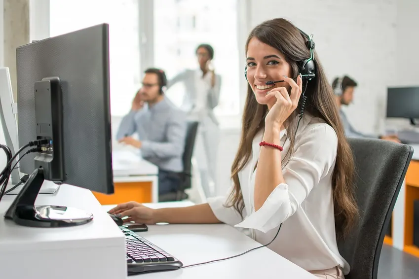 A customer service representative on a headset