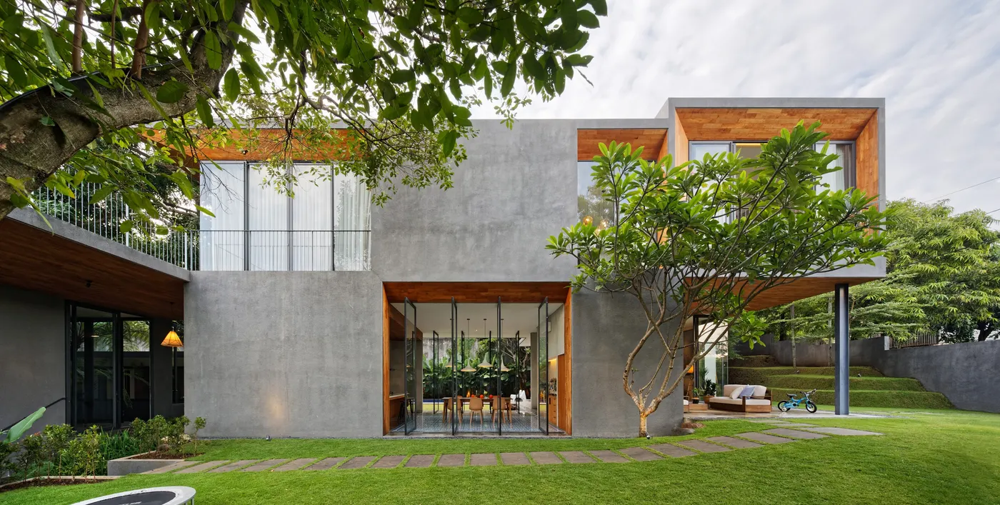 A modern home with a trimmed front lawn